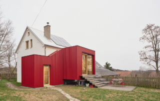 Facha architekti, House With a Red Addition, Nečín, Czech Republic. Photo: Peter Fabo.