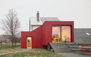 Facha architekti, House With a Red Addition, Nečín, Czech Republic. Photo: Peter Fabo.