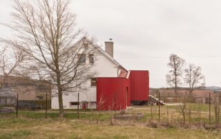 Facha architekti, House With a Red Addition, Nečín, Czech Republic. Photo: Peter Fabo.